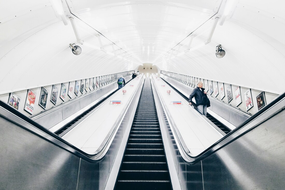 One Line or Two on Escalators?